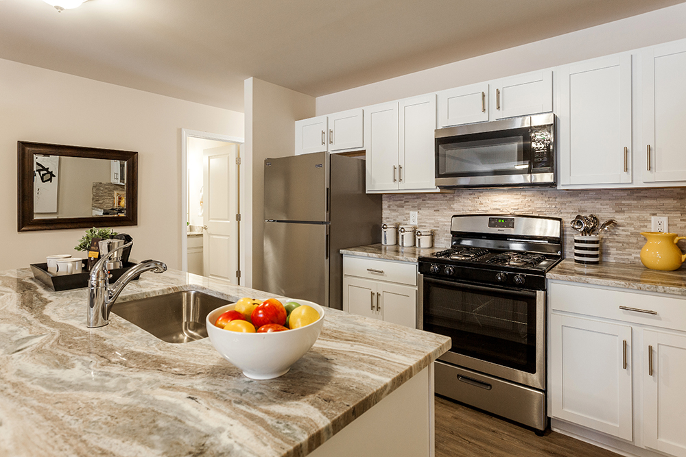 Layouts of Our Ranch-Style Apartments - Cascade Pointe of Saline - CascadePointeApartmentsSalineMIKitchenGranite_3503